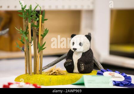 Toronto, Canada. 9th Feb, 2020. A carved wooden giant panda with bamboos is seen during the 2020 Toronto Woodworking Show in Toronto, Canada, on Feb. 9, 2020. As one of the newest consumer woodworking shows in Canada, this annual event celebrated everything to do with wood for hobbyist and professionals from Friday to Sunday. Credit: Zou Zheng/Xinhua/Alamy Live News Stock Photo