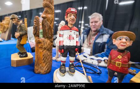 Toronto, Canada. 9th Feb, 2020. Carved wooden figures are seen during the 2020 Toronto Woodworking Show in Toronto, Canada, on Feb. 9, 2020. As one of the newest consumer woodworking shows in Canada, this annual event celebrated everything to do with wood for hobbyist and professionals from Friday to Sunday. Credit: Zou Zheng/Xinhua/Alamy Live News Stock Photo