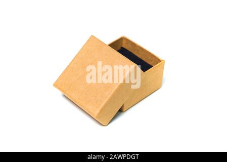 Empty opened brown small cardboard box with lid for mock up isolated on white background. Stock Photo