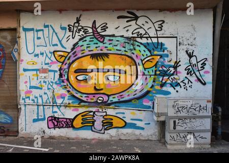 yellow monster Graffiti in Florentin Tel Aviv Stock Photo