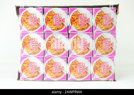 Princeton New Jersey February 9, 2020: Nissin Cup noodle on white background. Selective focus. Instant noodles were invented in 1958 by Momofuku Ando. Stock Photo