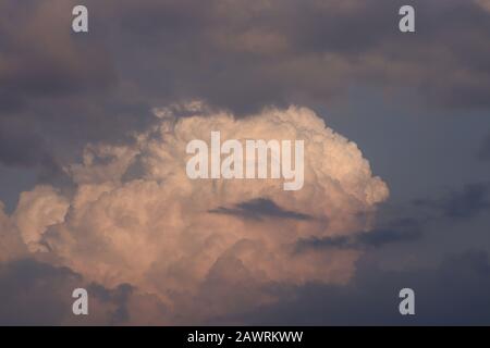 close-up or front view of black and white clouds under the clear blue sky in rain season , clouds texture and background -weather concept Stock Photo