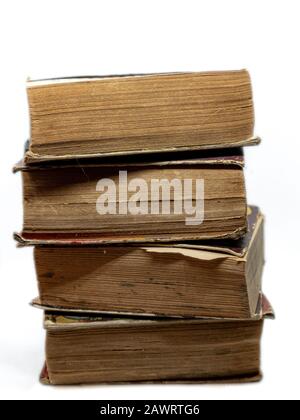 Antique old books isolated on white background. Selective focus Stock Photo