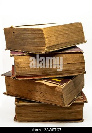 Antique old books isolated on white background. Selective focus Stock Photo