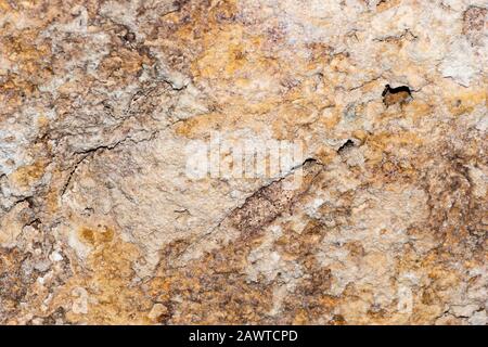A grunge texture background of an old  stone relief wall Stock Photo