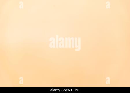 A light yellow/beige soft gradient Stock Photo