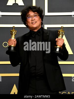 Parasite director Bong Joon Ho and cast members walking on the red carpet  at the 92nd Annual Academy Awards held at the Dolby Theatre in Hollywood,  California on Feb. 9, 2020. (Photo