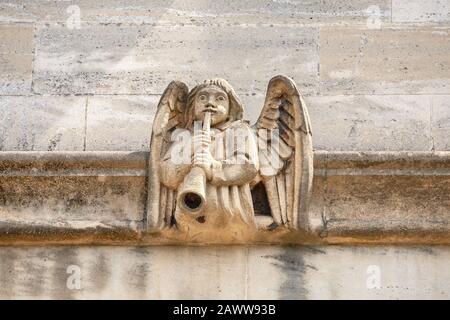 Medieval carved stone angel gargoyle. Oxford, Oxfordshire, England Stock Photo