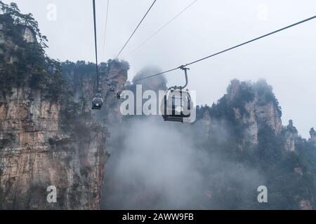 Moving Cable Cars of Zhangjiajie National Forest Park, UNESCO World Heritage Site, Wulingyuan, Hunan, China Stock Photo