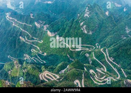 Heaven Linking Avenue of 99 curves at winding Road to The Heaven's Gate, Zhangjiagie, Tianmen Mountain National Park, Hunan, China Stock Photo