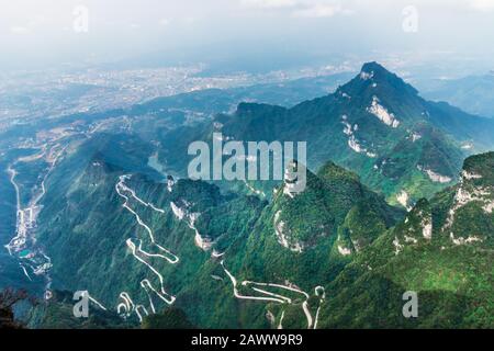 Heaven Linking Avenue of 99 curves at winding Road to The Heaven's Gate, Zhangjiagie, Tianmen Mountain National Park, Hunan, China Stock Photo