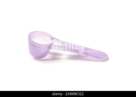 Measured plastic spoon isolated on white Stock Photo