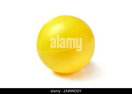 Yellow plastic ball isolated on white Stock Photo