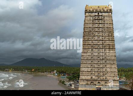 Medieval India dravidian architecture of world famous, 20-storeyed Gopuram, an entrance tower of Lord Shiva Temple in Murdeshwara during rainy season. Stock Photo