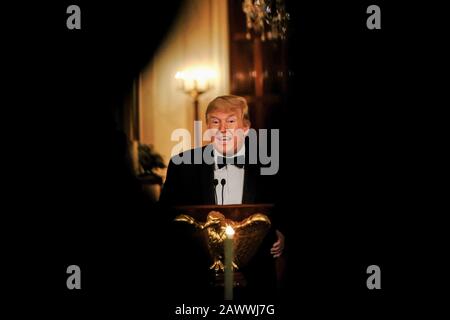 Hollywood, United States. 09th Feb, 2020. United States President Donald J. Trump makes remarks during the Governors' Ball at the White House in Washington, U.S., on Sunday, February 9, 2019. Trump was recently acquitted by the US Senate in the impeachment trial. Credit: Alex Wroblewski/Pool via CNP/AdMedia/Newscom/Alamy Live News