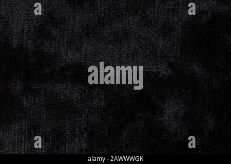Strict black velvet background for design, texture for creative design work. Stock Photo