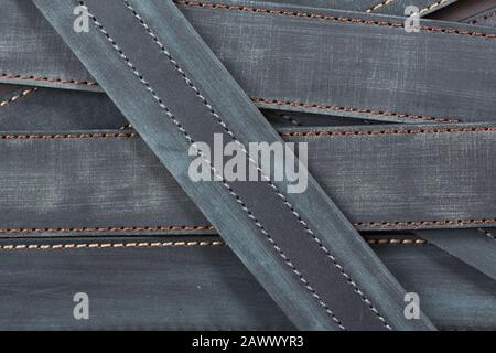 Grey leather strap isolated. Can be used as background in art or design projects. Stock Photo