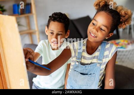 Concept of early childhood education, painting, talent, happy kids Stock Photo