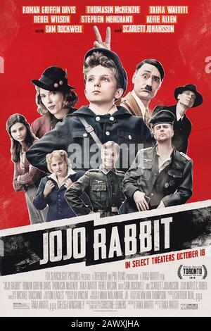 Jojo Rabbit (2019) directed by Taika Waititi starring Roman Griffin Davis, Thomasin McKenzie, Scarlett Johansson and Sam Rockwell. Comedy based on Christine Leunens Caging Skies novel about the Hitler Youth. Stock Photo