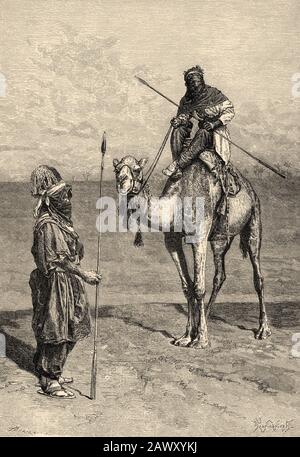 Portrait of Tuaregs on a journey, North Africa. Old engraving illustration from the book Nueva Geografia Universal by Eliseo Reclus 1889 Stock Photo