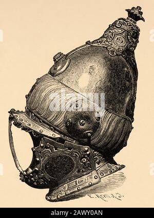 Turkish helmet from the Battle of Lepanto, 16th century. History of Philip II of Spain. Old engraving published in Historia de Felipe II by H. Fornero