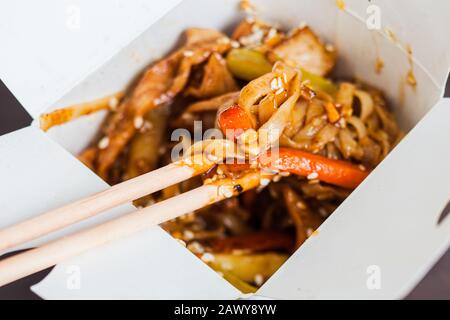Asian vegan udon noodles with tofu and vegetables Stock Photo