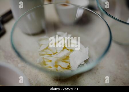 almond flakes in bowl in kitchen Stock Photo