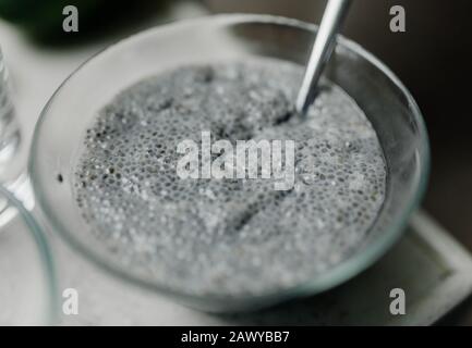 Chia Pudding in Glass Bowl in Kitchen Stock Photo