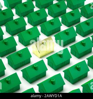Golden house amongst many houses, house prices concept Stock Photo
