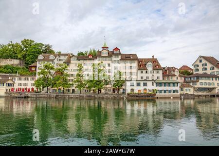 Zurich, Switzerland - June 10, 2017: Famous sight Taufergedenkplatte, river Limmat in front. View from Limmatquai. Stock Photo