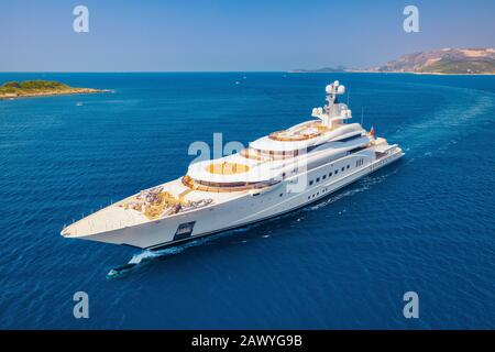 Aerial view of luxury yacht and blue sea at sunny bright day Stock Photo