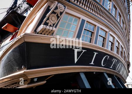 Stern (rear) of Nelson's flagship HMS Victory in dry dock in Portsmouth Historic Dockyard, UK. Stock Photo
