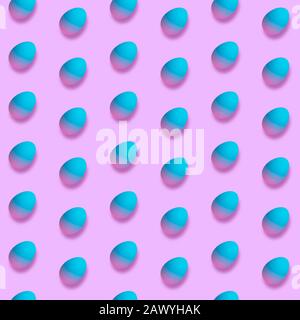Card for Happy Easter celebrating or greeting. Neon blue colored eggs on pink background. Modern artwork, bright wallpaper, background, pattern for your device, design or advertisement. concept. Stock Photo