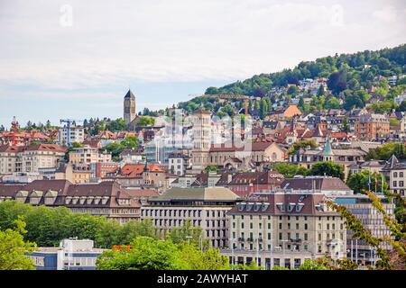 Zurich, Switzerland - June 10, 2017: View over Zuerich, Liebfrauen church, Cinema Capitol, and Central Plaza Hotel. Stock Photo