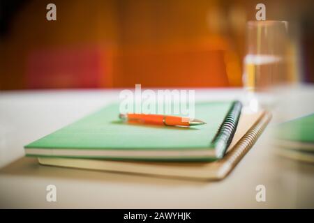 Close up spiral notebooks and pen Stock Photo