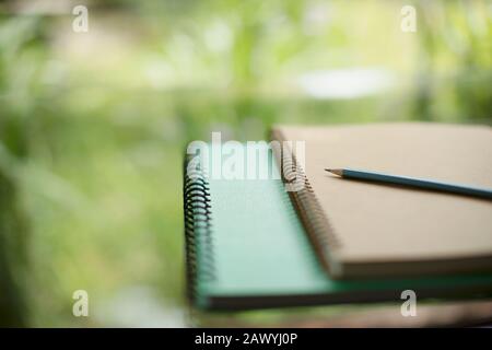 Close up spiral notebooks and pencil Stock Photo
