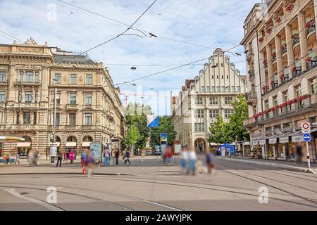 Square Paradeplatz , inner city of Zurich, view towards shopping promenade called Bahnhofstrasse. Stock Photo