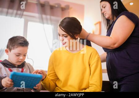 Family using digital tablet Stock Photo