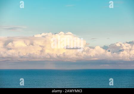 Mid day seascape with incredible clouds off the coast of St Martin Stock Photo