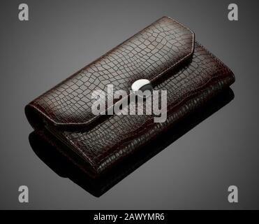 Fashionable leather men's wallet on a dark background Stock Photo