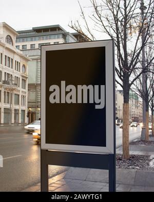 Blank black rectangular pylon stand on street mock up Stock Photo