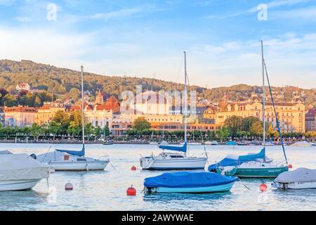 Lake Zurich (Zurichsee) at evening - boats in front - opera house in background Stock Photo