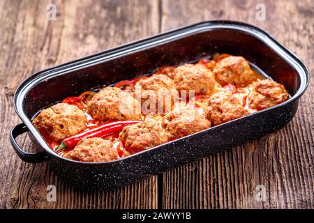 Homemade meatballs with sauce. Minced meat and vegetables. Stock Photo
