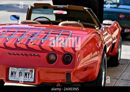 DOWNERS GROVE, UNITED STATES - Jun 07, 2019: An old red Corvette car in the parking lot in Downers Grove, United States Stock Photo