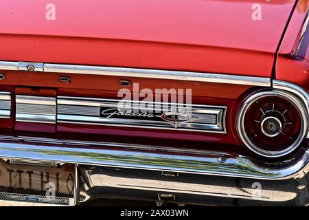 DOWNERS GROVE, UNITED STATES - Jun 07, 2019: An old red Barracuda car in the parking lot of Downers Grove, United States Stock Photo