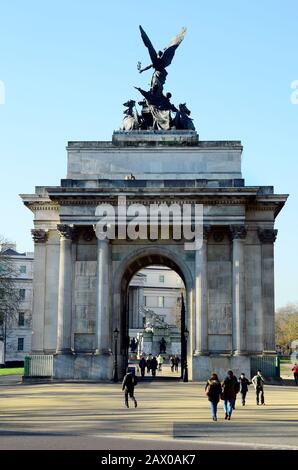 London, Great Britain - January 19th 2016: Unidentified people and Wellington arch memorial Stock Photo