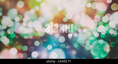 Magic Background With Color Festive background with natural bokeh and bright golden lights. Vintage Magic background Stock Photo