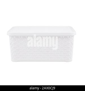 White rattan wicker basket with lid front view isolated on white background Stock Photo