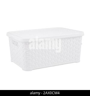 White artificial rattan wicker basket with lid side view isolated on white background Stock Photo