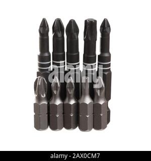 Set of big and small bits for screwdrivers and drills isolated on a white background Stock Photo